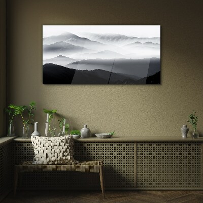 Glasbild Nebliges Bergpanorama