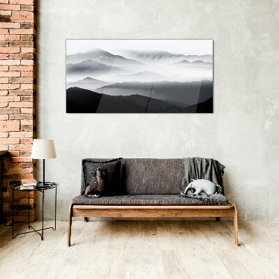 Glasbild Nebliges Bergpanorama