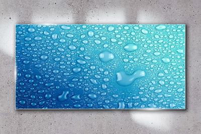 Glasbild Wassertropfen auf blauem Hintergrund