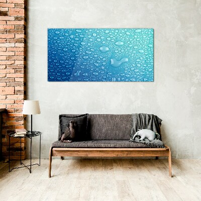 Glasbild Wassertropfen auf blauem Hintergrund