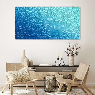 Glasbild Wassertropfen auf blauem Hintergrund