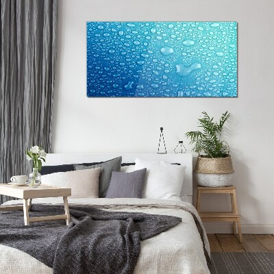 Glasbild Wassertropfen auf blauem Hintergrund