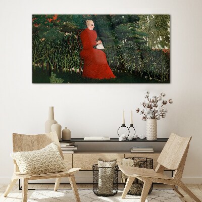 Glasbild Roter Mantel im Garten