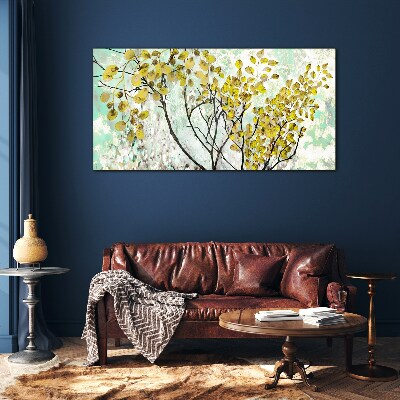 Glasbild Frühlingsblätter vor dem blauen Hintergrund