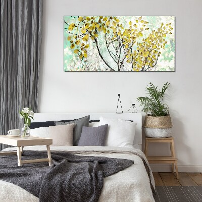 Glasbild Frühlingsblätter vor dem blauen Hintergrund