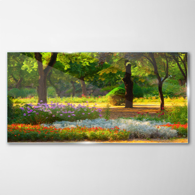 Glasbild Ein Blumenparadies im sonnigen Garten