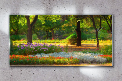 Glasbild Ein Blumenparadies im sonnigen Garten
