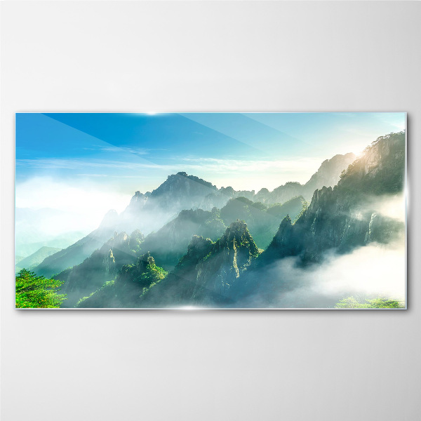 Glasbild Berglandschaft an einem nebligen Morgen