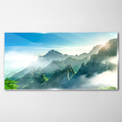 Glasbild Berglandschaft an einem nebligen Morgen
