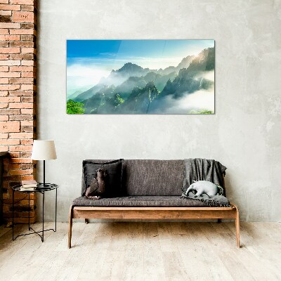Glasbild Berglandschaft an einem nebligen Morgen