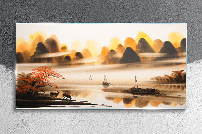 Glasbild Eine friedliche Landschaft mit Bergen und Wasser