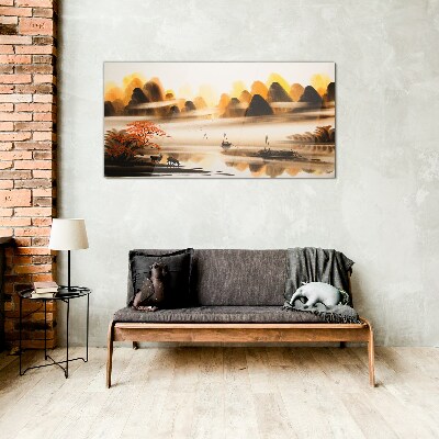 Glasbild Eine friedliche Landschaft mit Bergen und Wasser