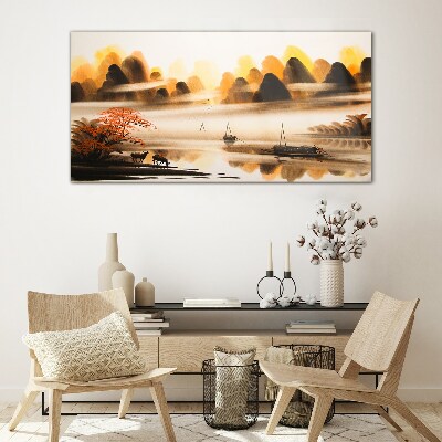 Glasbild Eine friedliche Landschaft mit Bergen und Wasser
