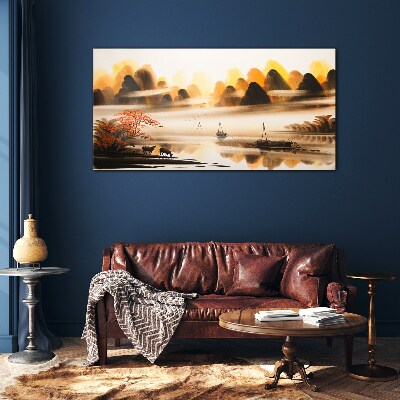 Glasbild Eine friedliche Landschaft mit Bergen und Wasser