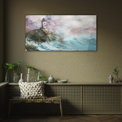 Glasbild Ein Leuchtturm in einer stürmischen Landschaft