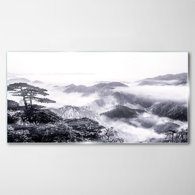 Glasbild Nebliges Bergpanorama