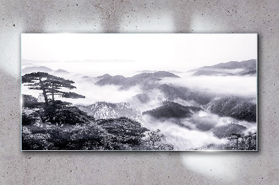 Glasbild Nebliges Bergpanorama