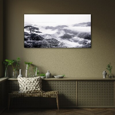 Glasbild Nebliges Bergpanorama