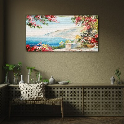 Glasbild Sommerliche Küstenlandschaft mit Blumen
