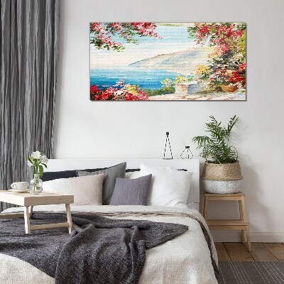 Glasbild Sommerliche Küstenlandschaft mit Blumen