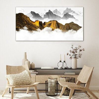 Glasbild Goldene Berge in den Wolken