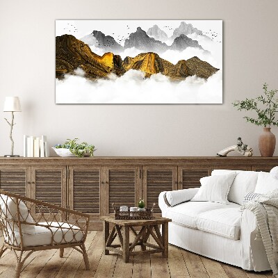 Glasbild Goldene Berge in den Wolken