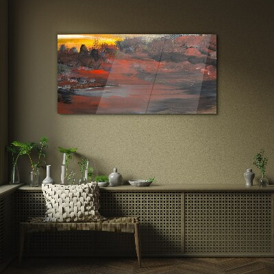 Glasbild Sonnenuntergang über einer Vulkanlandschaft