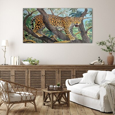 Glasbild Jaguar in einem tropischen Wald