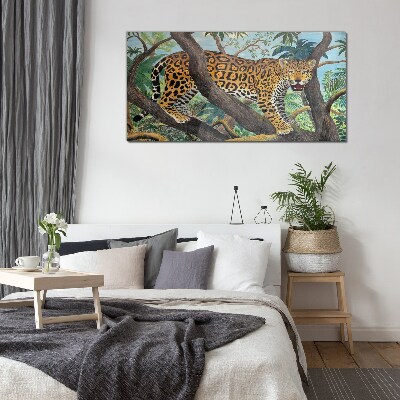 Glasbild Jaguar in einem tropischen Wald