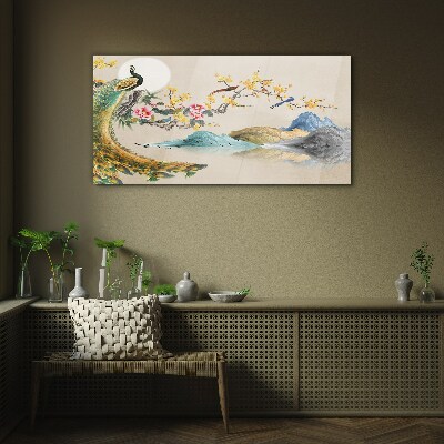Glasbild Pfau in blühender Landschaft