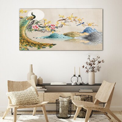 Glasbild Pfau in blühender Landschaft