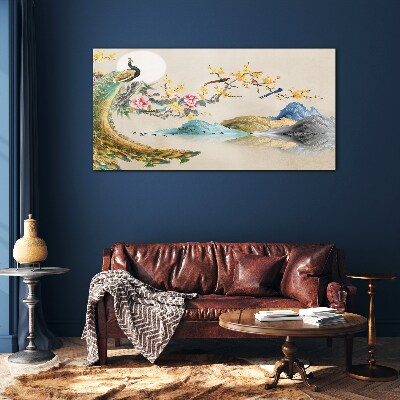 Glasbild Pfau in blühender Landschaft