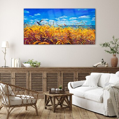 Glasbild Goldene Felder unter blauem Himmel