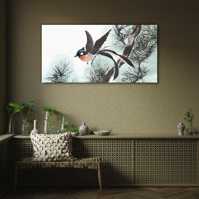 Glas bild Ein Vogel im Flug über den Kiefern