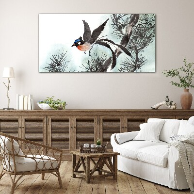 Glas bild Ein Vogel im Flug über den Kiefern