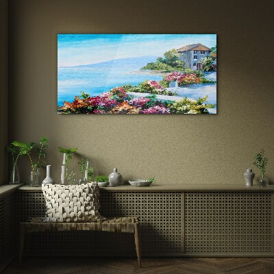 Glasbild Küstenlandschaft mit Blumen