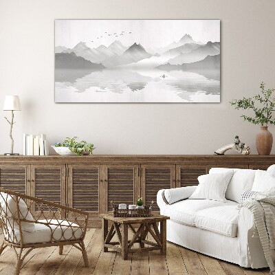 Glasbild Eine friedliche Berglandschaft in Monochrom