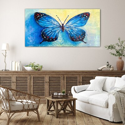 Glasbild Blauer Schmetterling auf abstraktem Hintergrund