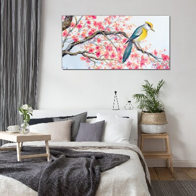 Glasbild Frühlingsvogel auf einem Ast