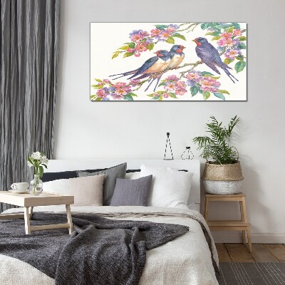 Glasbild Vögel in den blühenden Zweigen
