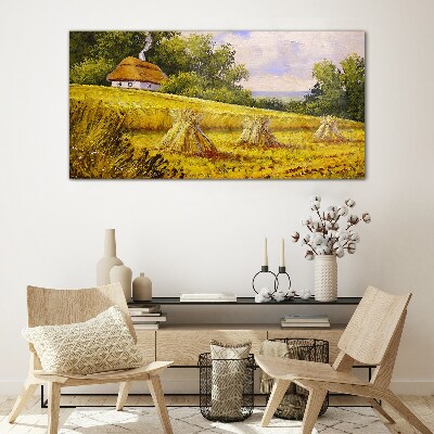 Glasbild Goldene Felder und ein Landhaus