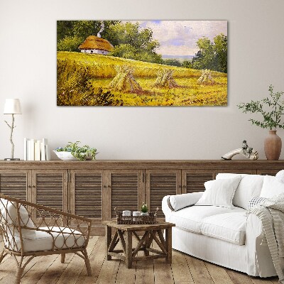 Glasbild Goldene Felder und ein Landhaus