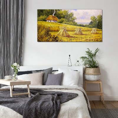 Glasbild Goldene Felder und ein Landhaus