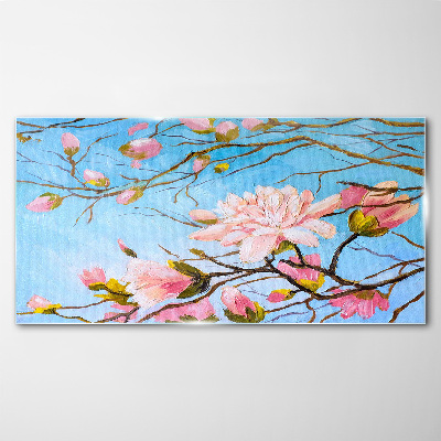 Glasbild Magnolienblüten auf blauem Hintergrund