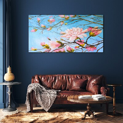 Glasbild Magnolienblüten auf blauem Hintergrund