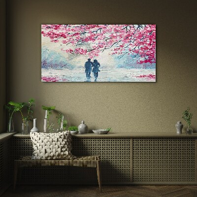 Glasbild Ein Frühlingsspaziergang unter blühenden Bäumen