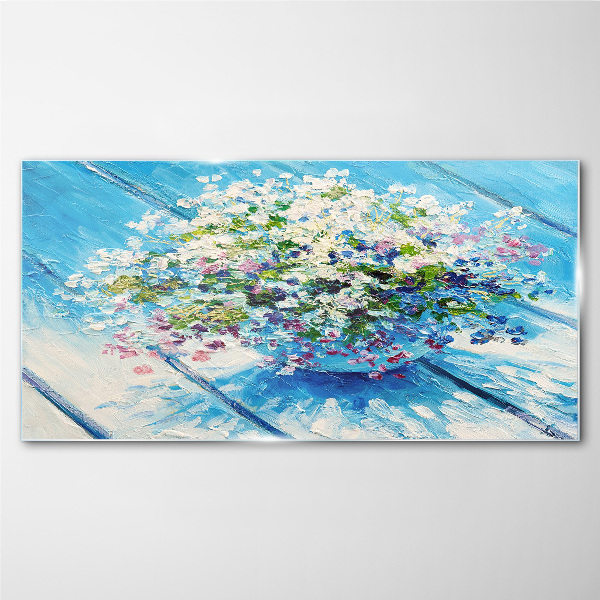 Foto glasbild Blumenkomposition auf blauem Hintergrund