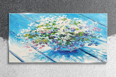 Foto glasbild Blumenkomposition auf blauem Hintergrund