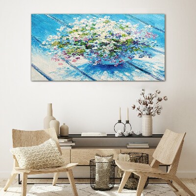 Foto glasbild Blumenkomposition auf blauem Hintergrund