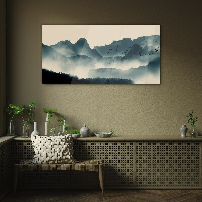 Glasbild Neblige Berglandschaft mit Vögeln
